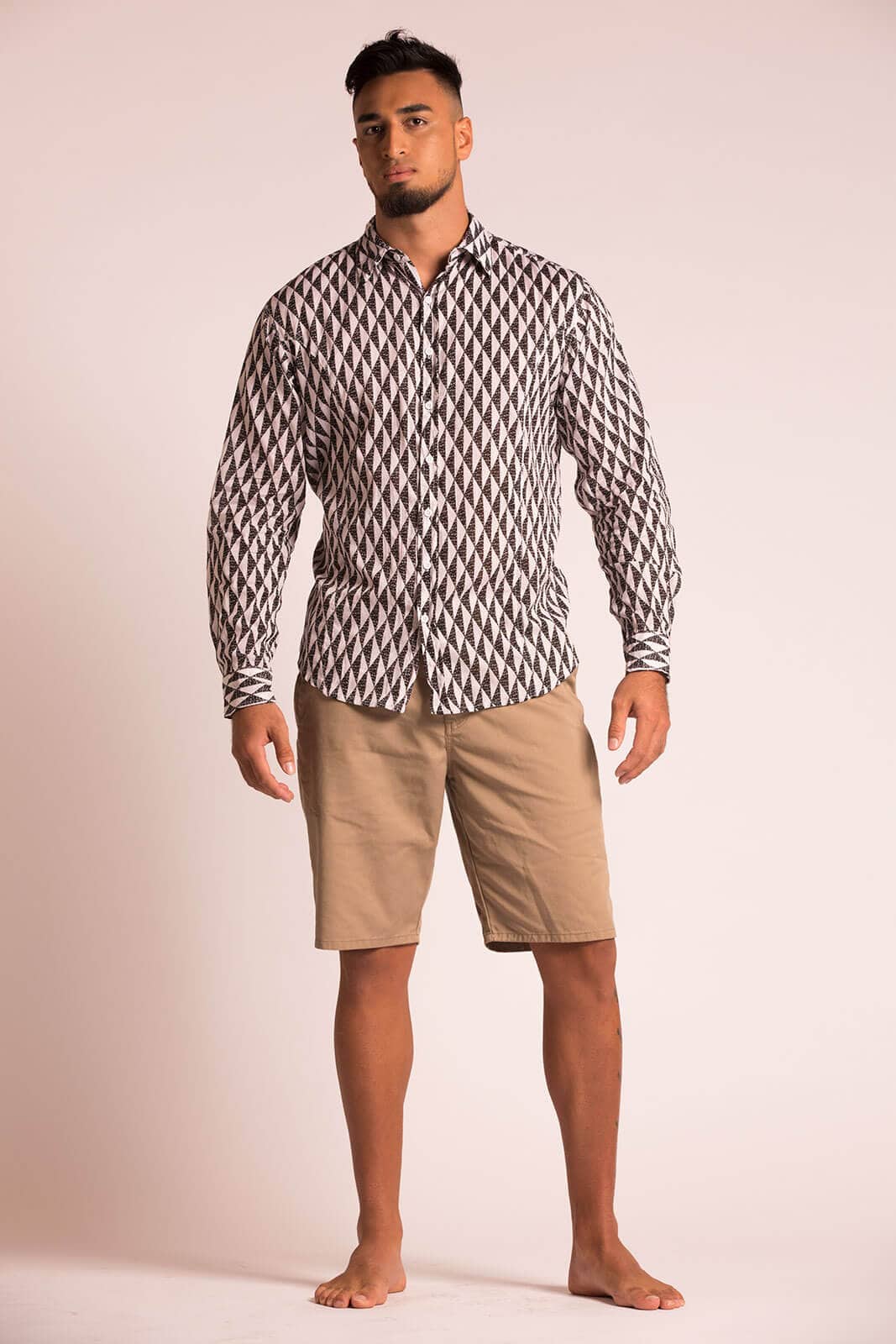 Male model wearing Hilo L-S in Mauna Pattern and Black and White Color - Front View