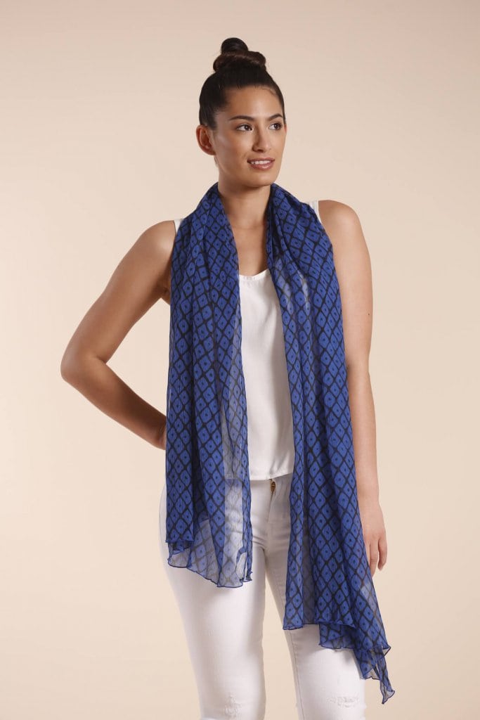Female model wearing a blue scarf