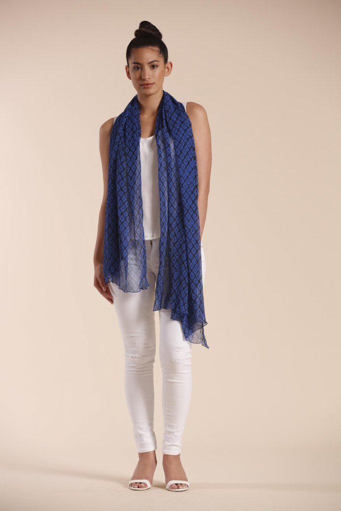 Female model wearing a blue scarf