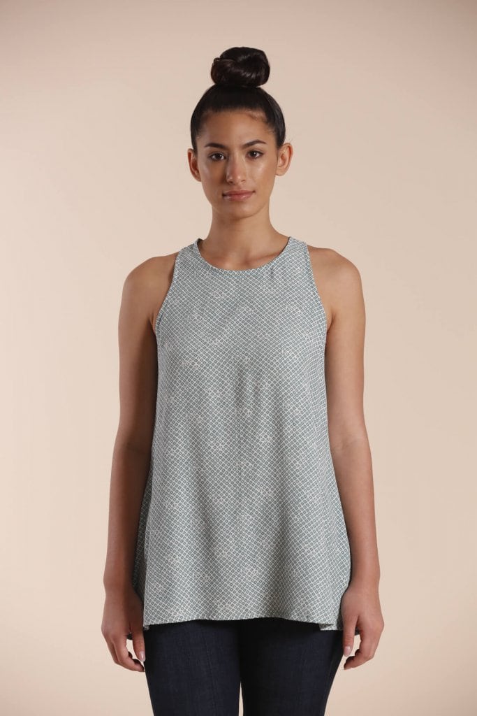 Female model wearing a Sleeveless Shirt in Grey - Front View