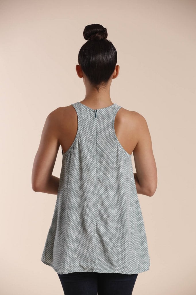 Female model wearing a Sleeveless Shirt in Grey - Back View