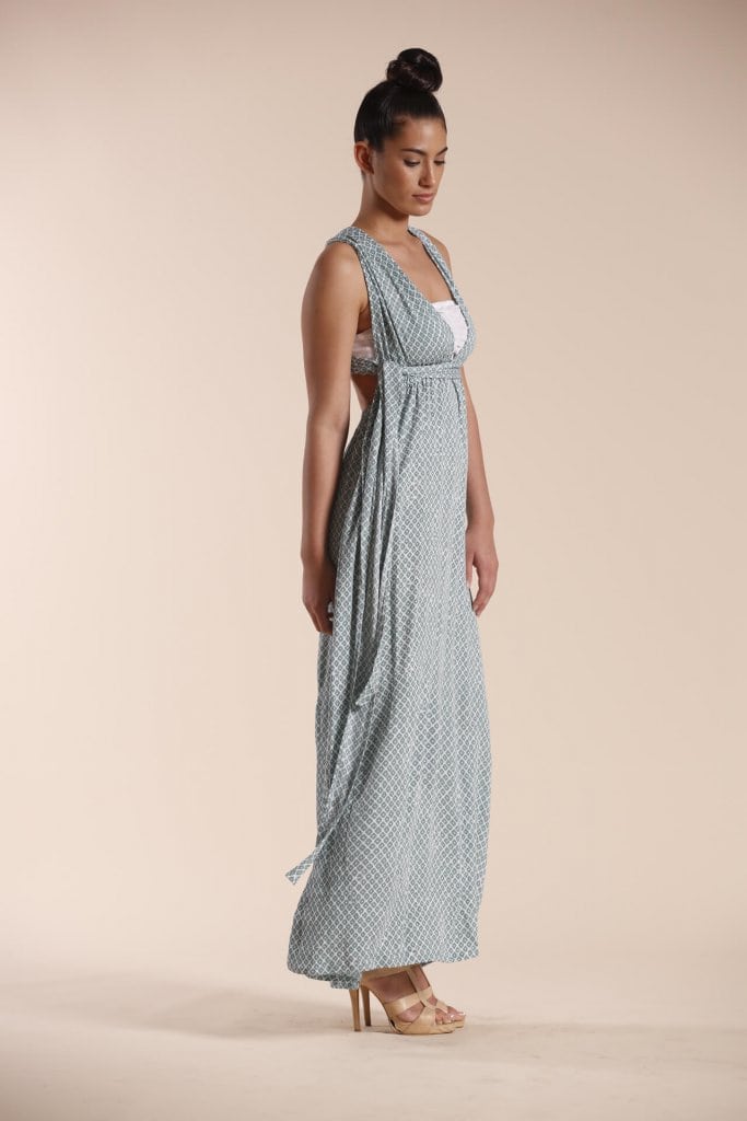 Female model wearing a Maxi Dress in light green - Side View