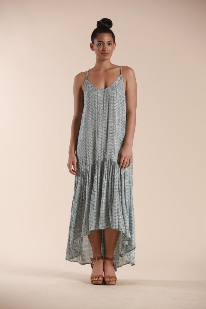 Female model wearing a Spaghetti Strap Hi Low Dress in sage green - Front View