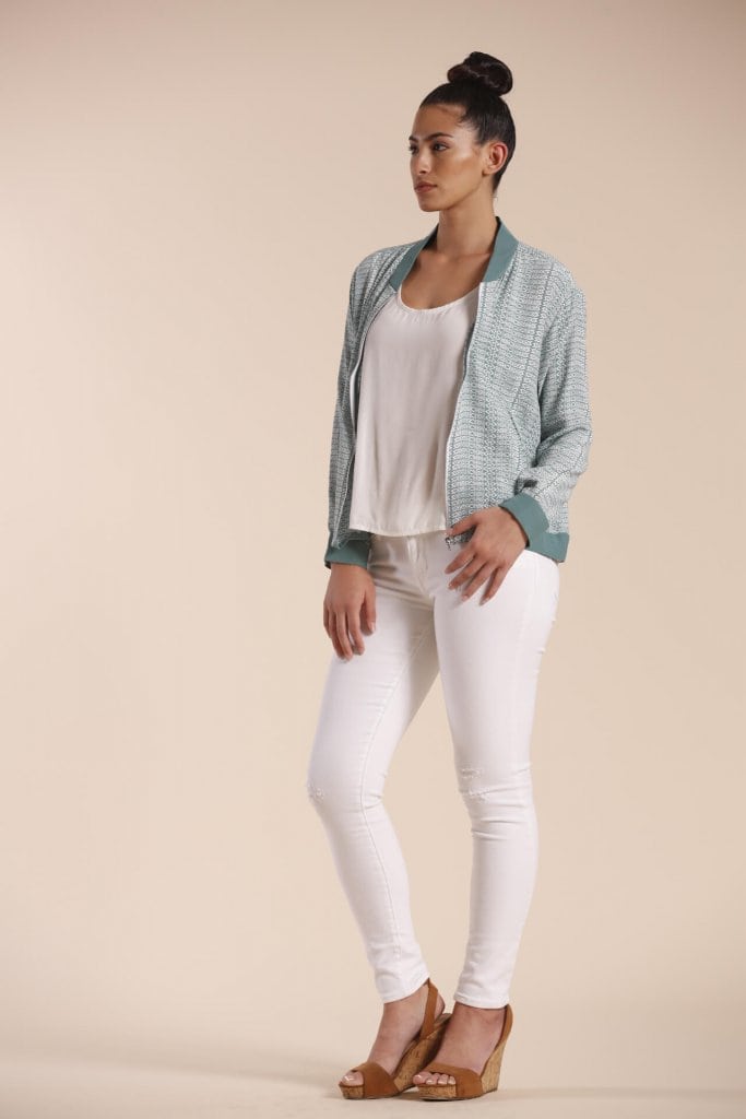 Female model wearing a Jacket in Light Green - Front View