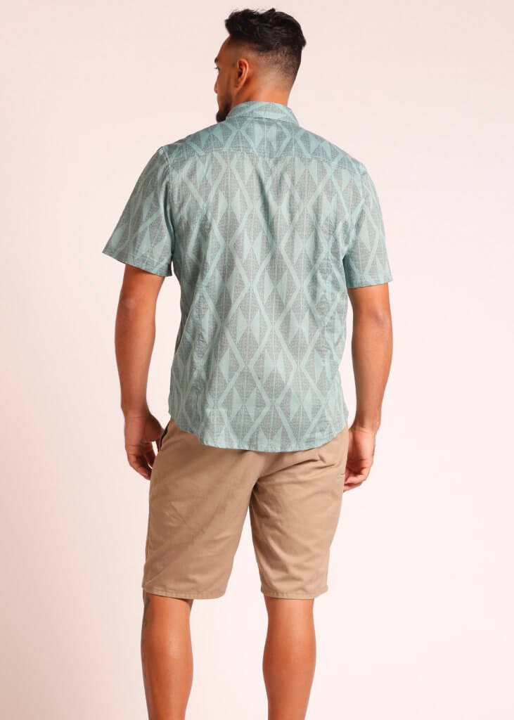 Male Model wearing Short Sleeve Button Up Shirt in Light Green - Back View