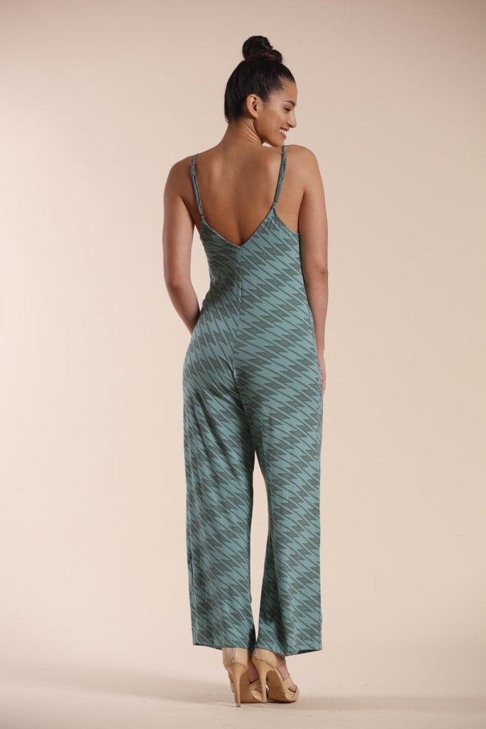 Female model wearing a Jumpsuit in Green - Back View