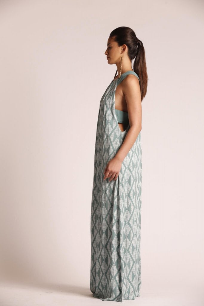 Female model wearing a Sleeveless Maxi Dress in sage green - Side View