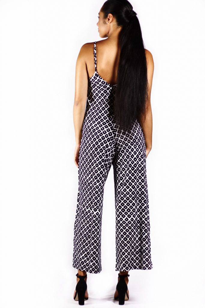 Model wearing Black patterned Jumpsuit - Back View