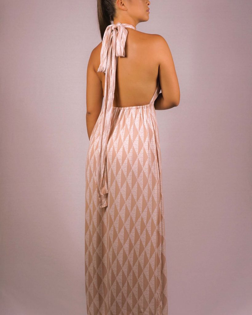 Female model wearing Peach Jumpsuit - Back View