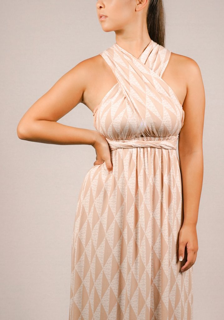 Female model wearing Peach Wrap Dress - Close Up
