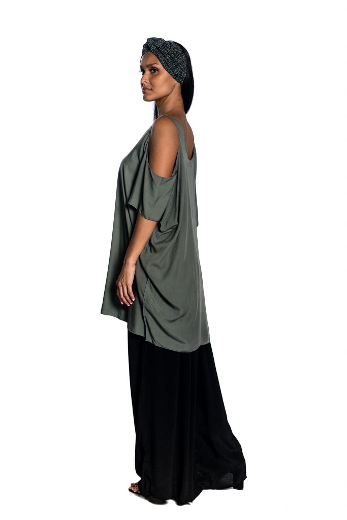 Female model wearing Open Shoulder Shirt in Solid Grey - Side View