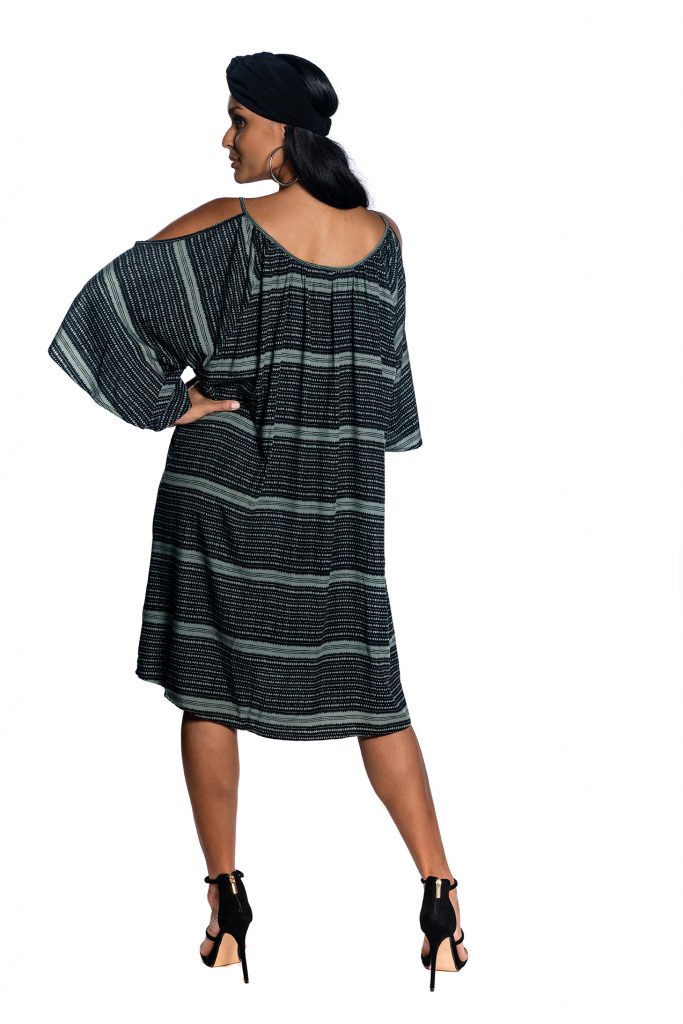 Female model wearing Black and Grey Dress - Back View