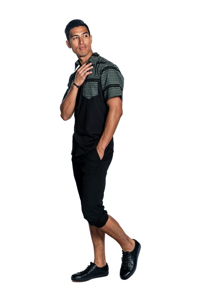 Male model wearing Short Sleeve Shirt in Black and Grey - Side View