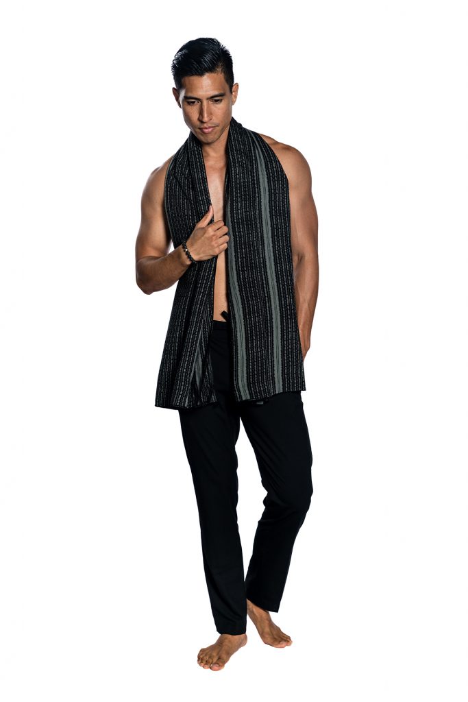 Male model holding Black and Grey Pareo