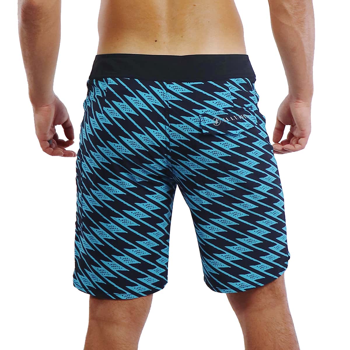 Male model wearing 4 Way Stretch Shorts in Uwila Pattern and Aqua Color - Back View