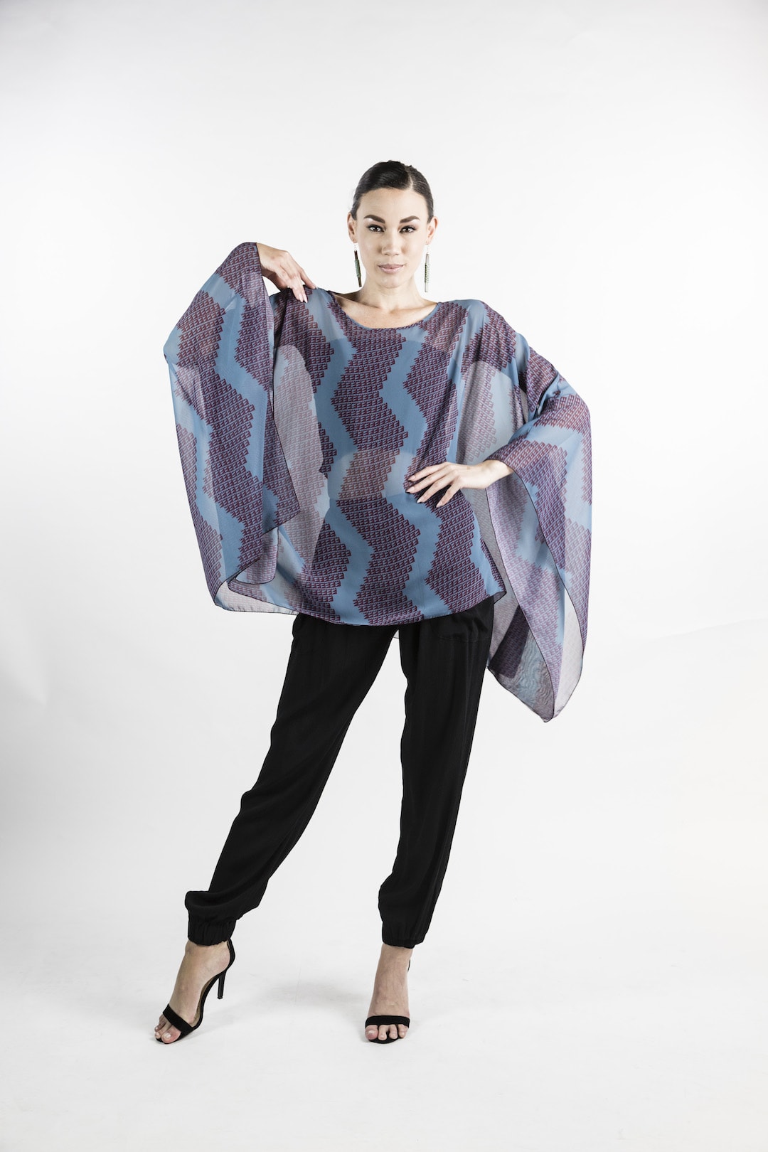 Female model wearing Kaftan in Red and Blue - Front View