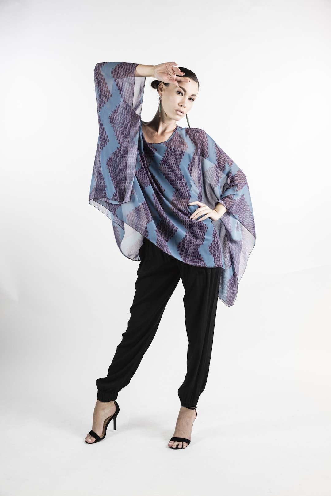 Female model wearing Kaftan in Red and Blue - Front View