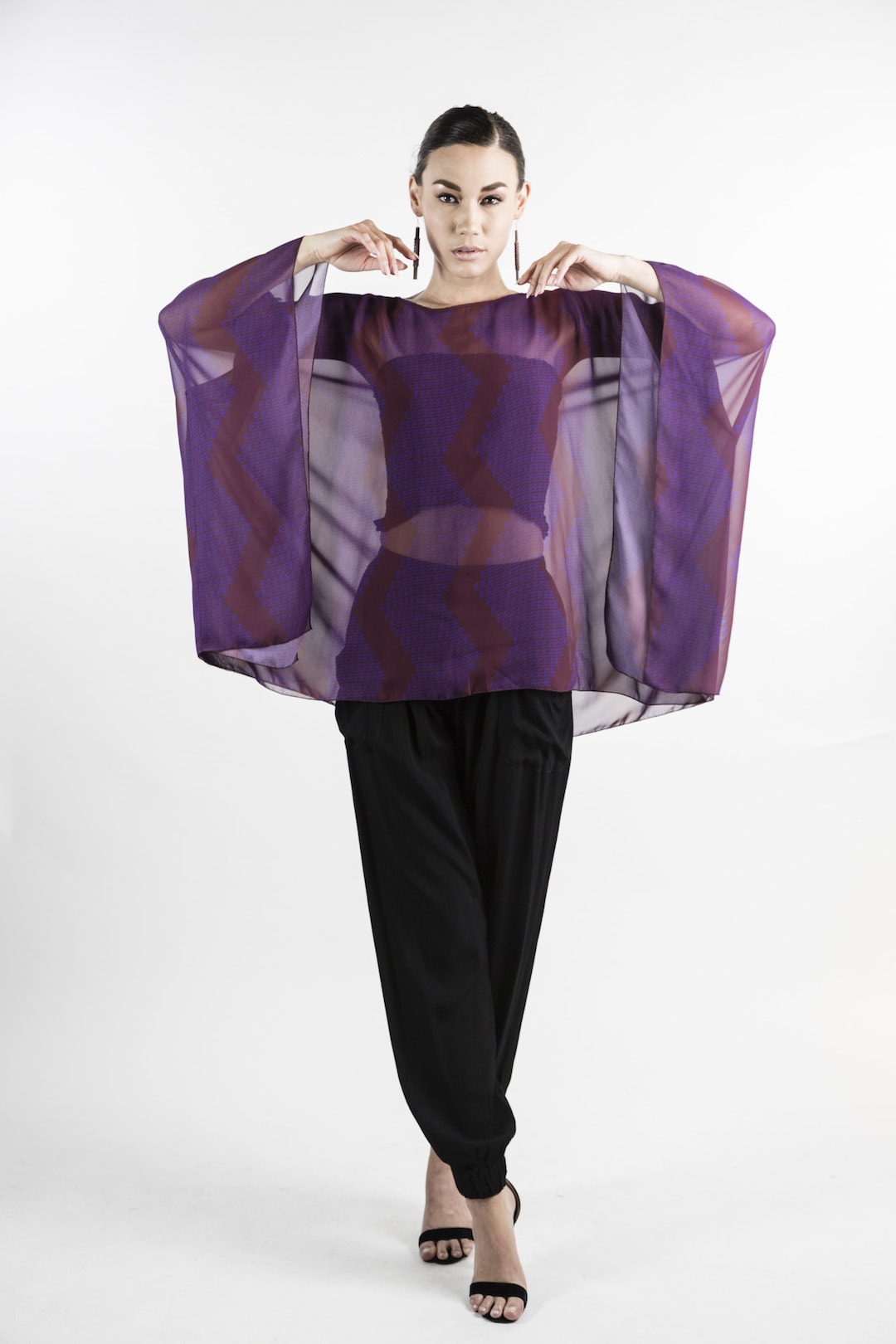 Female model wearing Kaftan in Purple - Front View