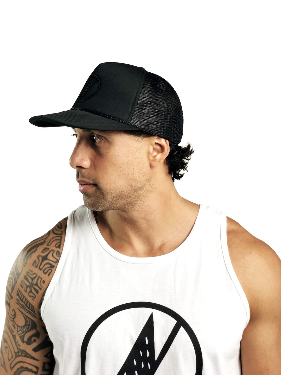 Male model wearing Logo Trucker Hat in Black - Side View