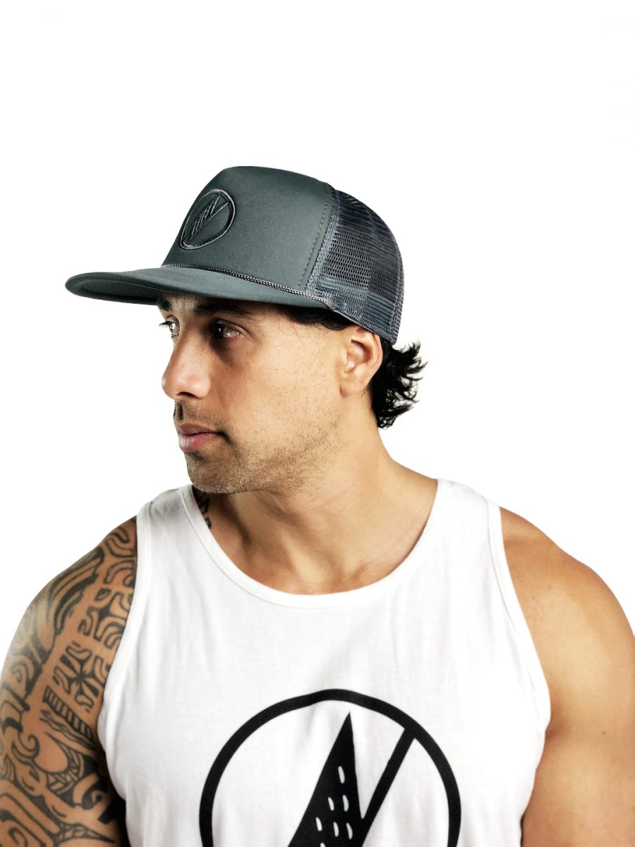 Male model wearing Logo Trucker Hat in Grey - Side View