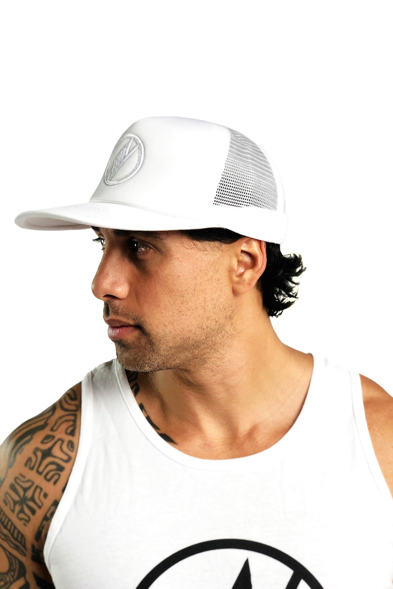Male model wearing Logo Trucker Hat in White - Side View
