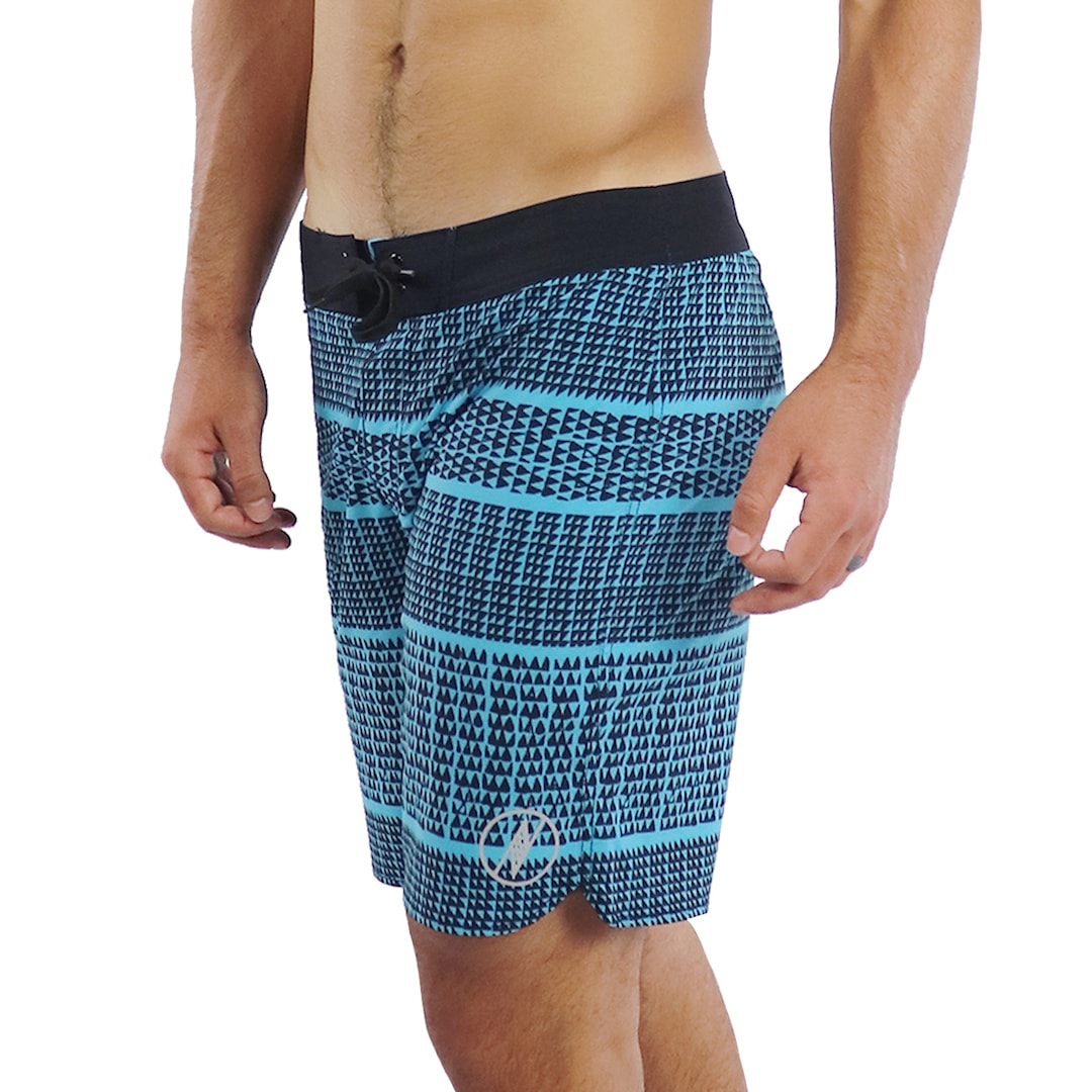 Male model wearing Boardshorts in Akoakoa Pattern and Blue - Side View
