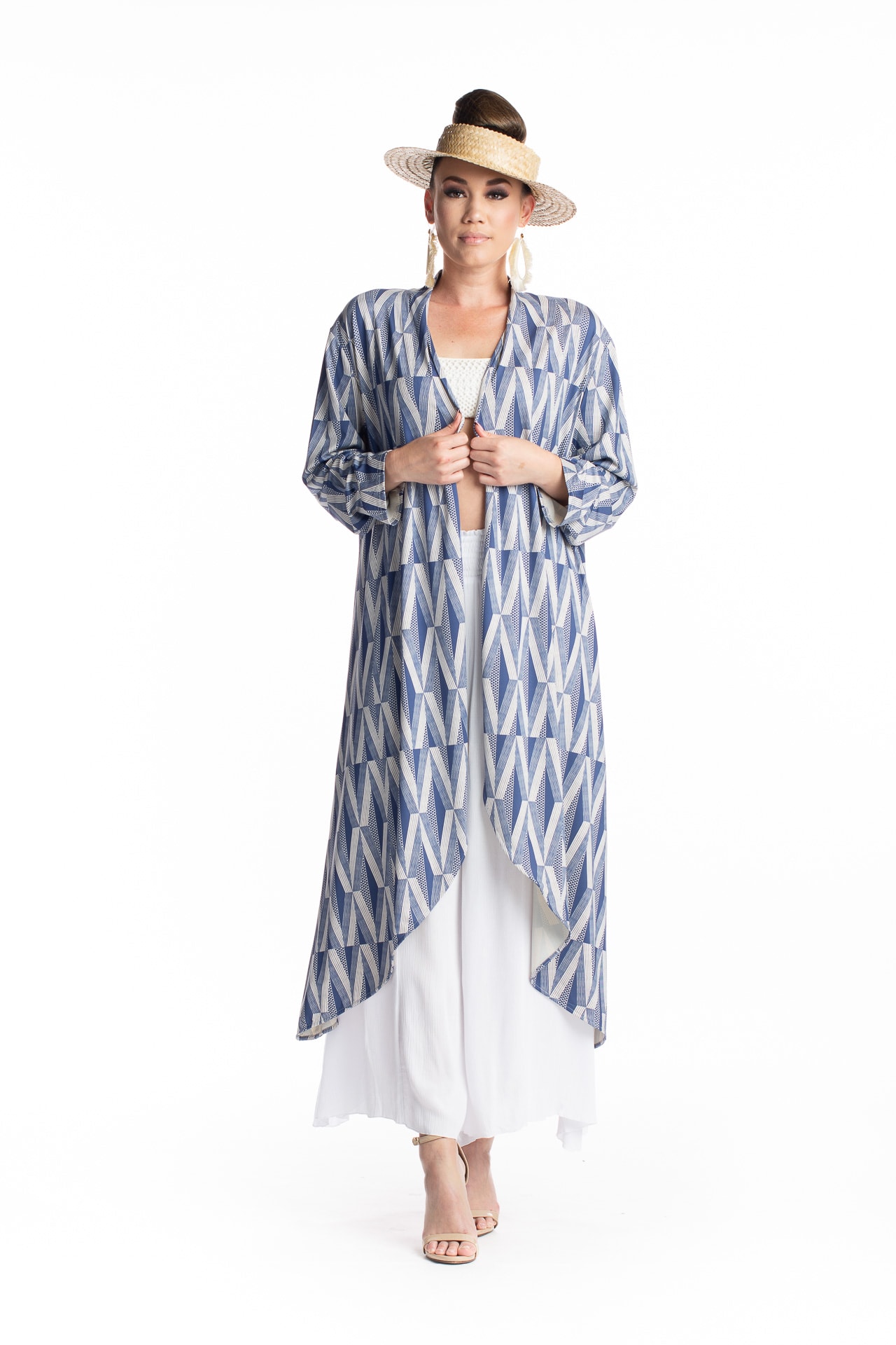 Female model wearing a Waiolu Cardign in Indigo Moon - Front View