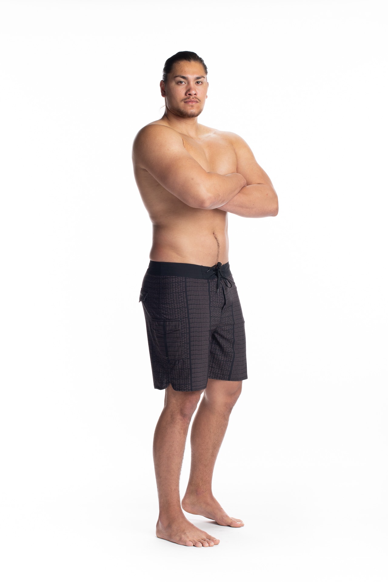 Male model wearing 4 Way Stretch in Black Brown Niho Ku - Side View