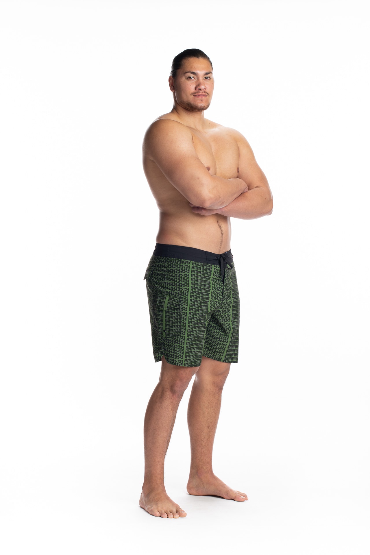 Male model wearing 4-way Stretch in Green Black Niho Ku - Side View