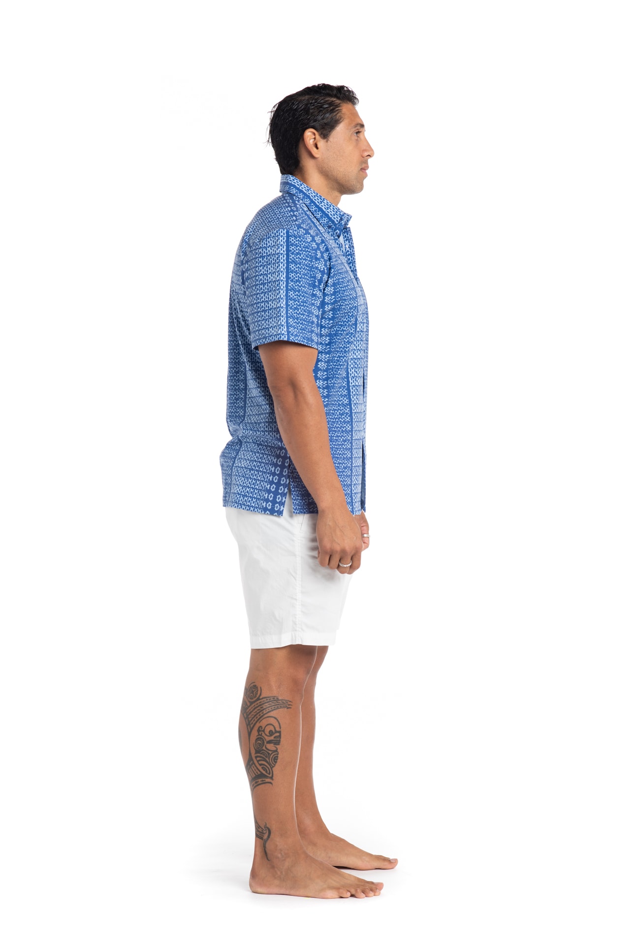 Male model wearing Mahalo Nui Shirt in Blue AkoaAkoa - Side View