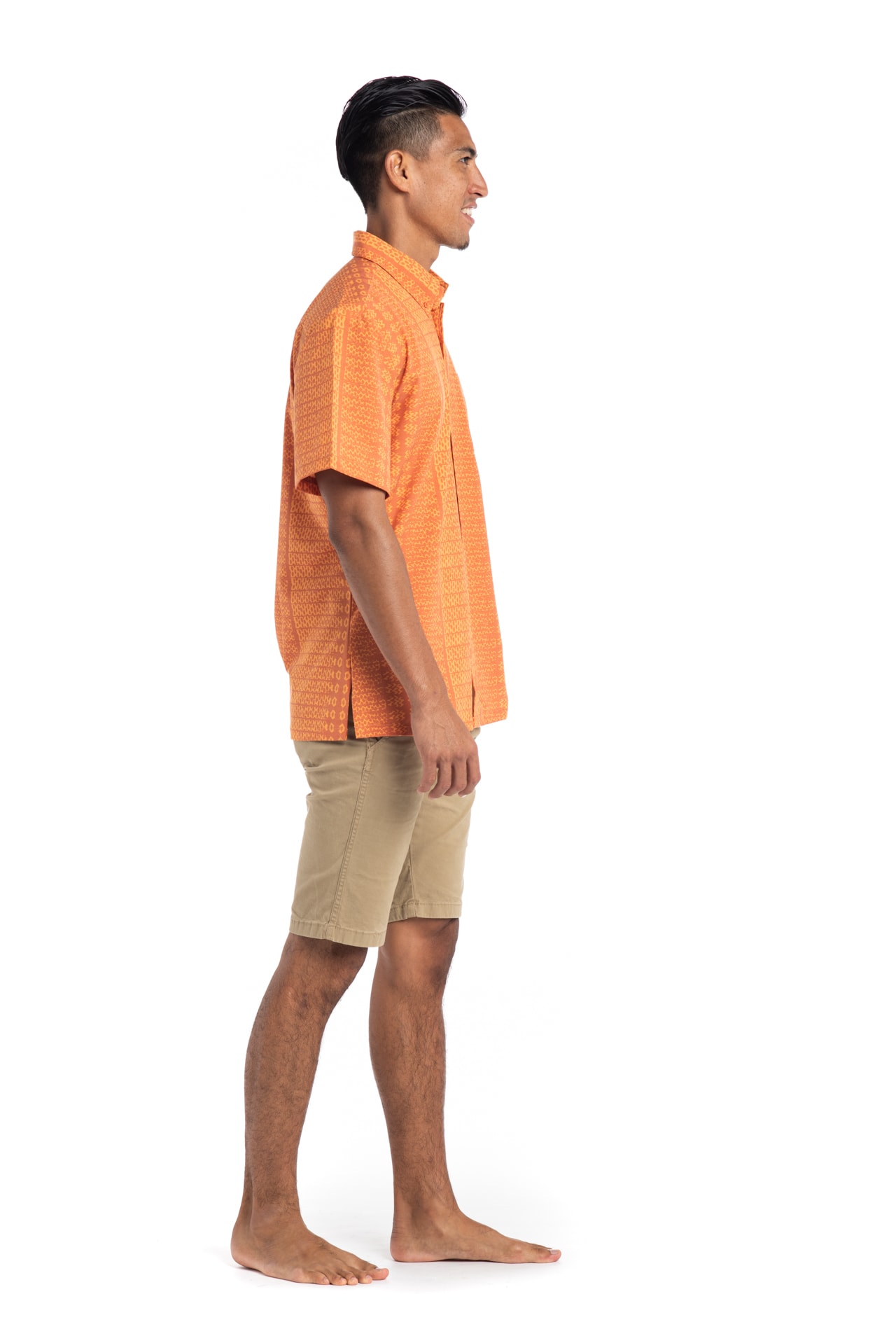 Male model wearing Mahalo Nui Shirt in Orange AkoaAkoa - Side View