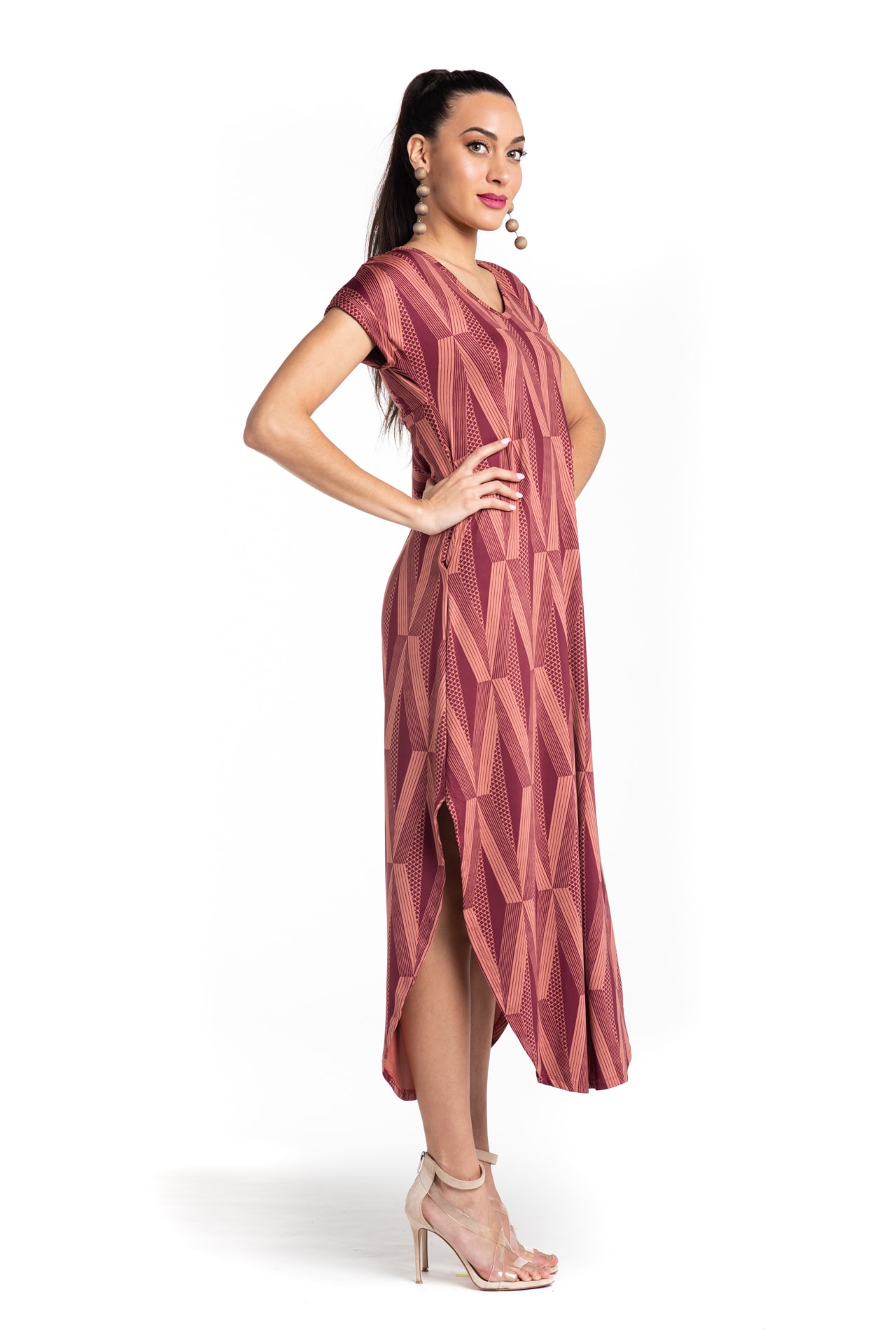 Model wearing Mahalo Nui Dress in Copper - Side View