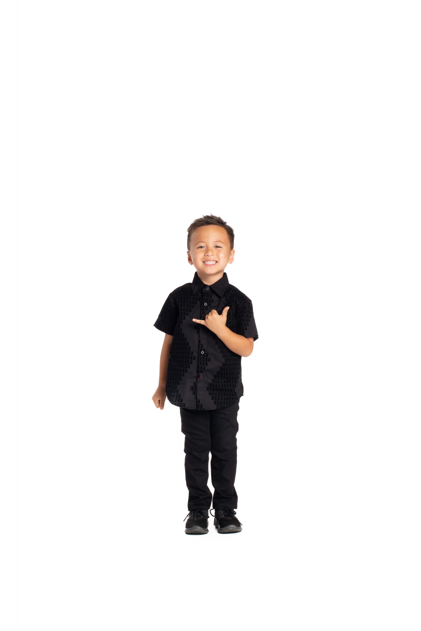 Boy wearing Keiki Aloha Short Sleeve in Black Niho Mano - Front View