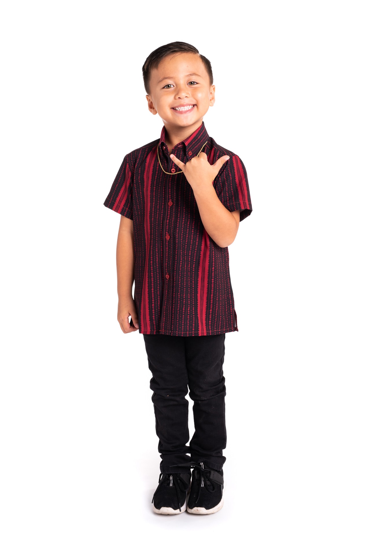 Boy wearing Keki Mahalo Shirt S-S in Jet Black/Brick Red Hoonionio