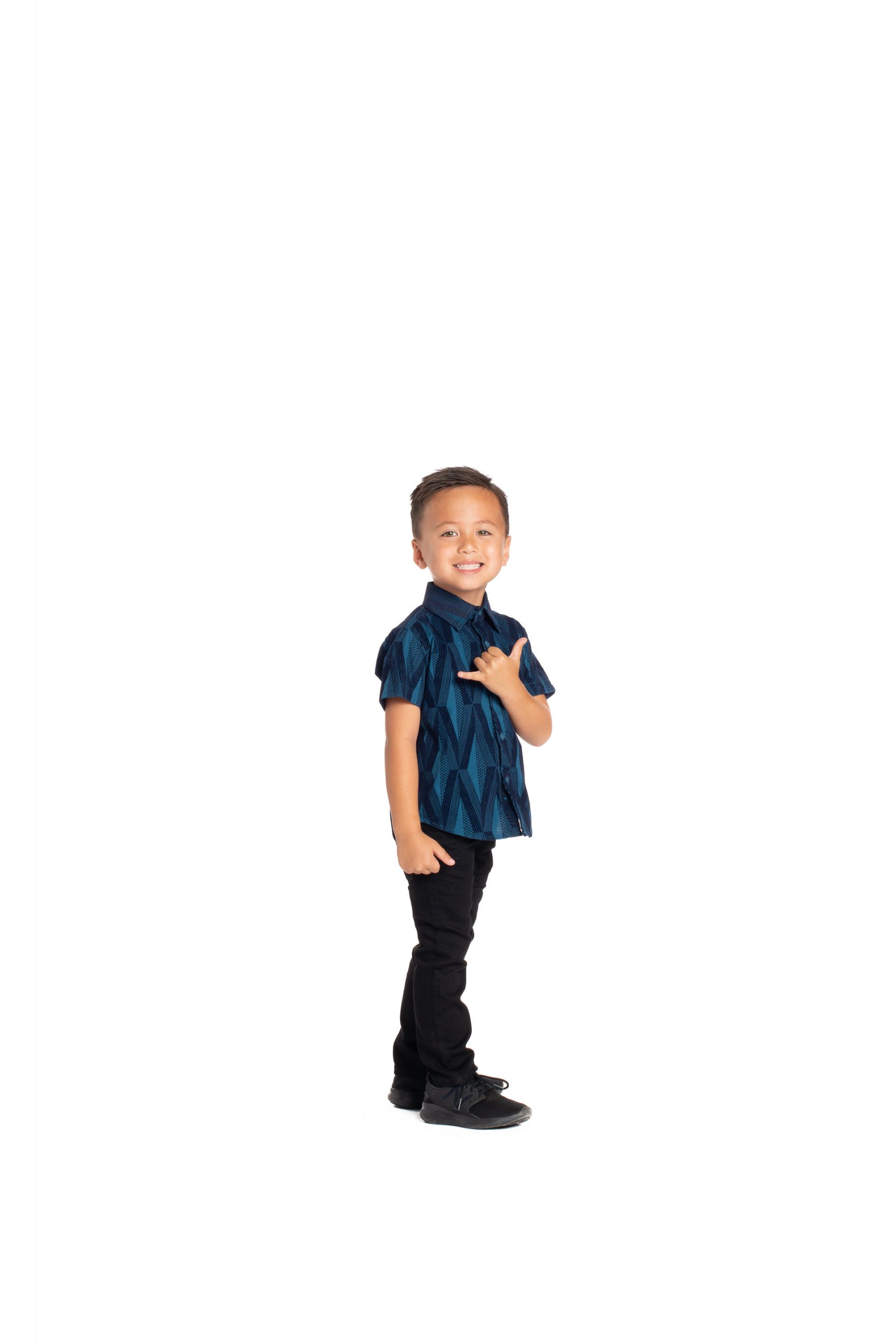 Boy wearing Keiki Aloha Short Sleeve in Teal Kanaloa - Side View
