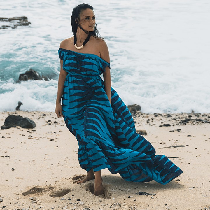 Model on the beach wearing Manaola Clothing