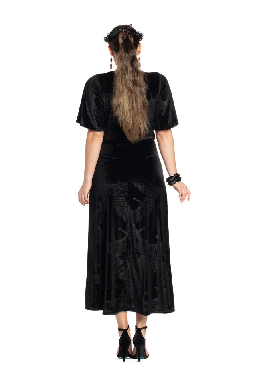 Model wearing Peahi Wrap Dress in Black - Back View