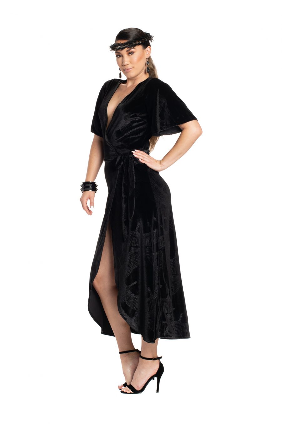 Model wearing Peahi Wrap Dress in Black - Side View
