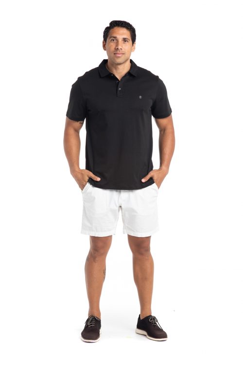 Male model wearing Waikii Polo in Black - Front View