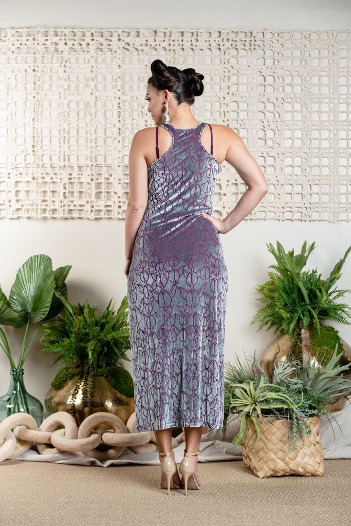 Model wearing Keahi Enaena Dress in Pixie Purple Kapualiko - Back View