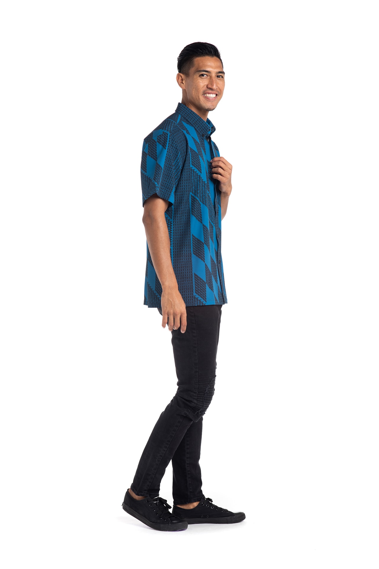 Male model wearing Mahalo Shirt in Blue Kamehameha - Side View