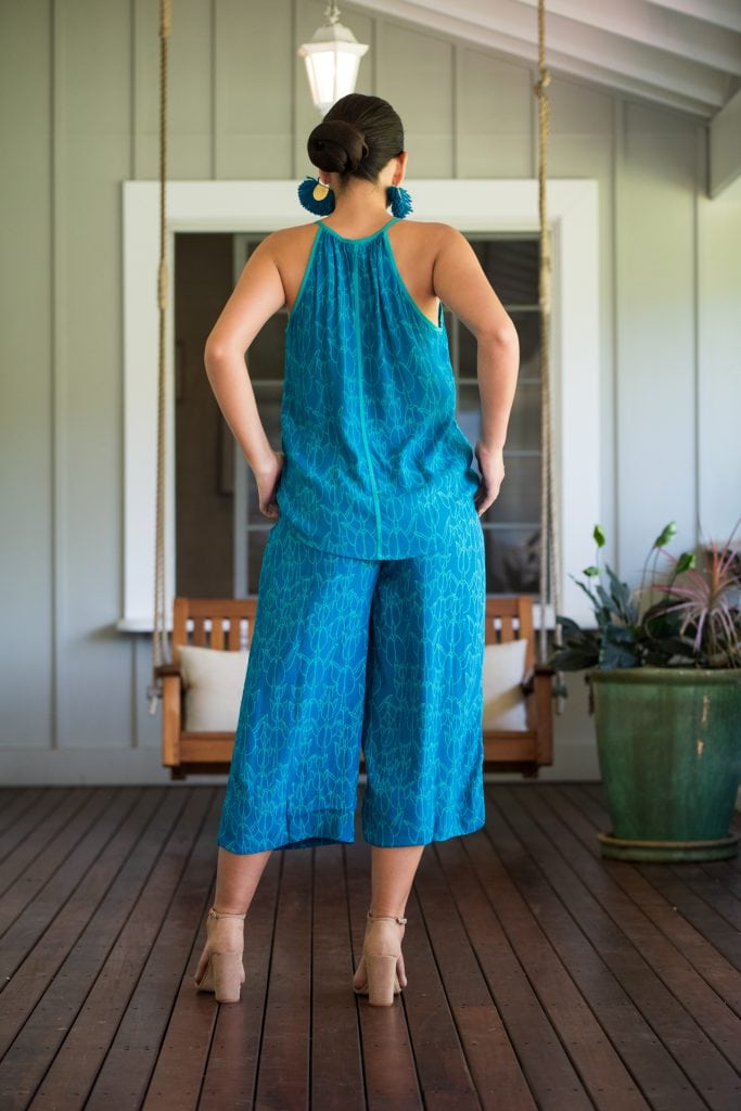 Model wearing Kaiulani Top in Blue/Blue Grass Kapualiko - Back View