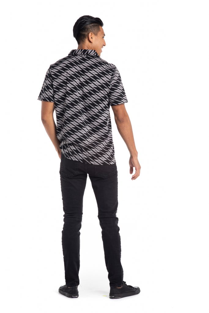 Male model wearing Waikii Polo - Back View