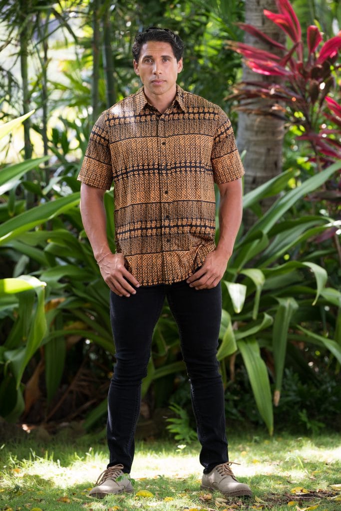 Male model wearing Golf Aloha Button Shirt in Golden Yellow Black Akoakoa Pattern - Front View