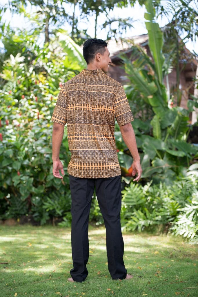 Male model wearing Golf Aloha Pullover Shirt in Golden Yellow Black Akoakoa Pattern - Back View