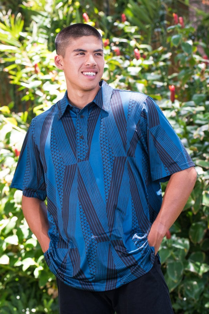 Male model wearing Golf Aloha Pullover in Blue Sapphire Black Kanaloa Pattern - Front View