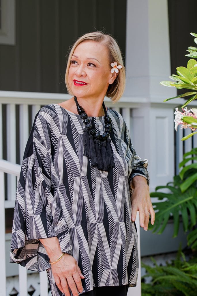 Model wearing Hoolaulea Top in Black Windchime Kanaloa Pattern - Front View