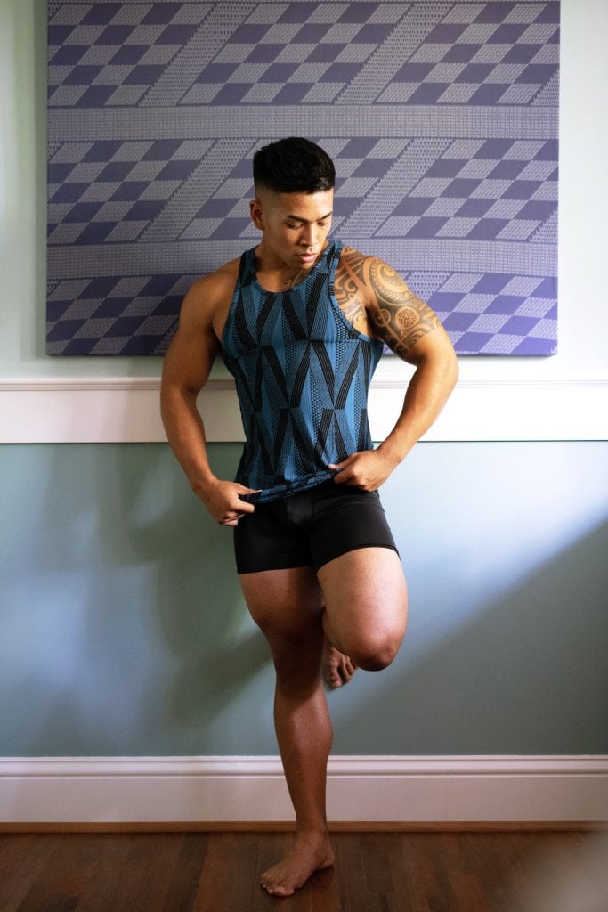 Male Model wearing Kawelo Ribbed Tank in Blue Sapphire Black Kanaloa Pattern - Front View