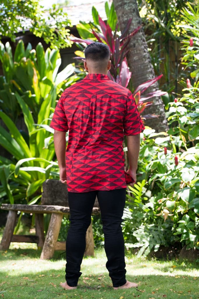 Male model wearing Golf Aloha Button in Chinese Red Black Mauna Pattern - Back View
