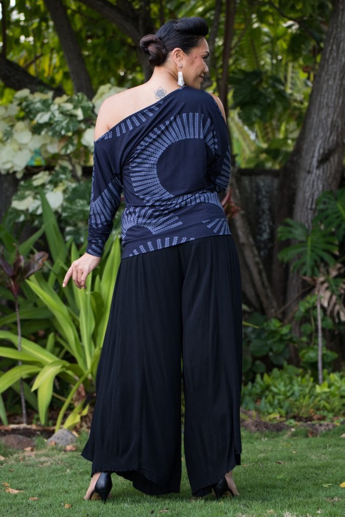 Model wearing Kipoohiwi Top in Deep Well Folkstone Grey Lalani Kalalea Pattern - Back View